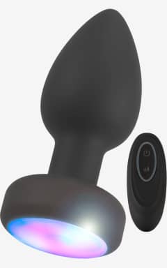 Analplugs Anos - RC Flashing Butt Plug with Vibration - Kompakter Silikon-Buttplug: wasserdicht, USB-ladbar, 7 Modi – Du bestimmst per Fernbedienung. Bunt blinkende LED und sicherer Fuß bringen extra Spielspaß, ganz ohne Stress.